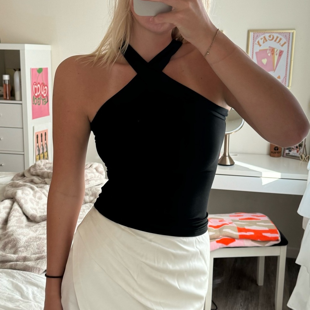 Black criss cross neck detail top